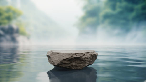 Stone pedestal display on surface of the lake